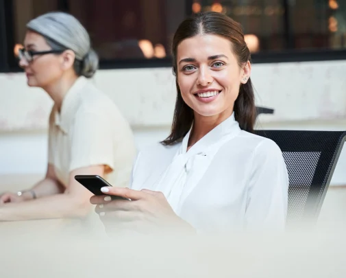 A Woman Holding A Phone