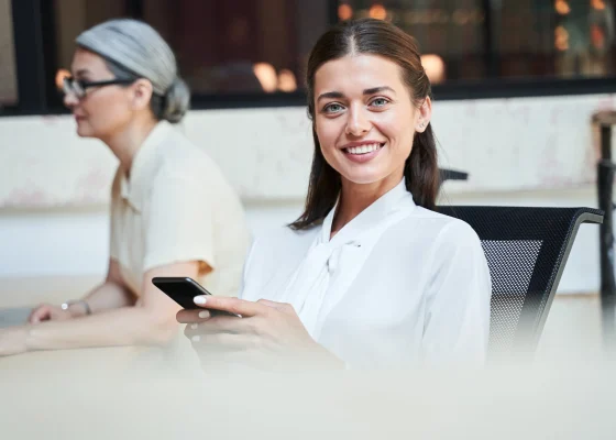 A Woman Holding A Phone