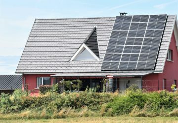 a house with solar panels on the roof